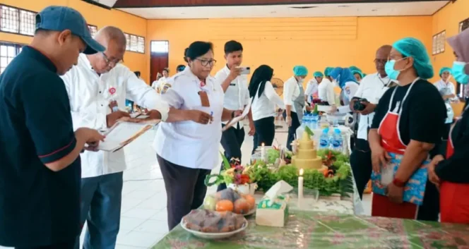 
					Tumpeng Kreatif Warnai HUT Papua Selatan Ke-3